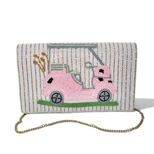 Load image into Gallery viewer, Handcrafted pink golf cart clutch featuring a golf cart filled with golf clubs on a soft pink and ivory beaded background.
