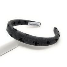 Load image into Gallery viewer, Gray headband with bow black patterns on a white background