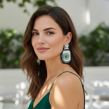 Load image into Gallery viewer, Elegant beaded drop earrings with green circular motif and black border