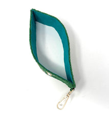 Load image into Gallery viewer, Green pouch with a reflective interior on a white background