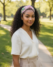 Load image into Gallery viewer, Woman wearing a white shirt and pink headband in a park