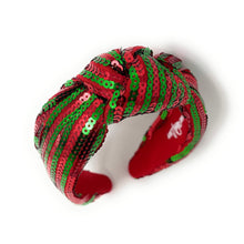 Load image into Gallery viewer, A vibrant headband adorned with alternating red and green sequins, forming a knot at the center. The design creates a festive, cheerful vibe.