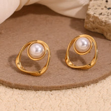 Load image into Gallery viewer, 18k Gold plated earrings with pearls on a textured surface