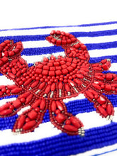 Load image into Gallery viewer, Coastal chic beaded handbag featuring blue and white stripes with a bold red crab centerpiece.