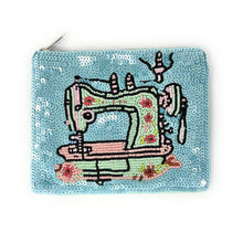 Load image into Gallery viewer, Handcrafted purse with a colorful sewing machine motif and floral accents.