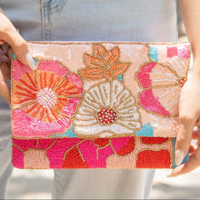 Load image into Gallery viewer, Vibrant pink statement clutch with floral beadwork and sequin embellishments.