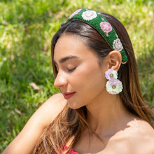 Load image into Gallery viewer, Statement floral headband showcasing detailed rose designs, green leaf accents, and luxurious handcrafted beadwork.