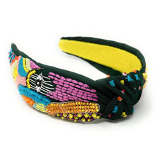 Load image into Gallery viewer, Bold artisan headband featuring vibrant pink, yellow, turquoise, and orange beadwork with intricate hand-stitched details and a knotted top.