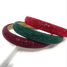 Load image into Gallery viewer, Three glittery headbands, one red and one green, on a white background.