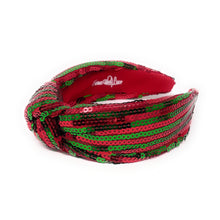 Load image into Gallery viewer, A vibrant headband adorned with alternating red and green sequins, forming a knot at the center. The design creates a festive, cheerful vibe.