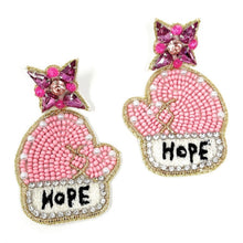 Load image into Gallery viewer, Handcrafted pink mitten dangle earrings with sparkling crystal flower studs, detailed beadwork, and inspirational “Hope” lettering.