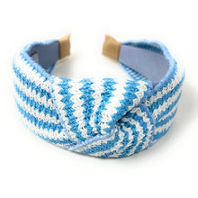 Load image into Gallery viewer, headband for woman, fashion headbands, blue raffia knot headband, woven headbands for women, stylish headbands, raffia headband style, top knot headband, woven top knot headband, blue white headband, raffia hair band, blue white raffia headband, raffia woven headband, women top knot headband, best selling items, sky blue knot headband, woven top knot headband, handmade headbands, top knotted headband, knotted headband, boho headband, summer headband, blue color headband, resort headband