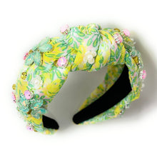 Load image into Gallery viewer, Summer Knot headband, resort knot headband, floral knotted headband, vacation accessories, multicolor top knot headband, yellow green headband, resort headband, green yellow color hair band, tropical fabric headband, custom jeweled headband, multi color knotted headband, beach hair accessories, summer accessories, summer accessories, vacation headband, summer top knot headband, custom headband, handmade headbands, beach knotted headband, best selling items, jeweled headband, handmade gifts