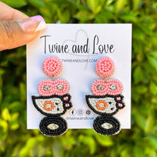 Load image into Gallery viewer, Halloween beaded Earrings, beaded halloween Earrings, halloween Earrings, Pink Halloween Earrings, earrings for halloween, pink ghost beaded earrings, spooky beaded earrings, Pink black ghost earrings, Unique earrings, statement earrings, Halloween jewelry, cat earrings, Pink ghost, BOO earrings, costume jewelry, Holiday earrings, custom earrings, custom designs, Black pink earrings, dangling earrings, lightweight earrings, halloween accessories, pink halloween vibes, spooky vibes, handmade gifts