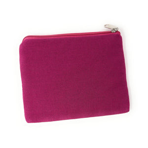 Pink zippered pouch on a white background