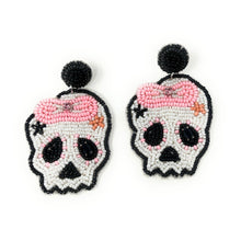 Load image into Gallery viewer, Halloween beaded Earrings, beaded halloween Earrings, halloween Earrings, Halloween Bead Earrings, earrings for halloween, pink bow skull earrings, spooky beaded earrings, skull earrings, Unique earrings, statement earrings, Halloween jewelry, Pink bow earrings, candy corn, spooky earrings, costume jewelry, Holiday earrings, custom earrings, custom designs, cat earrings, dangling earrings, lightweight earrings, autumn accessories, halloween vibes, spooky vibes, trick or treat accessories, handmade gifts