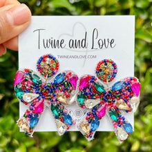Load image into Gallery viewer, bow beaded Earrings, beaded bow Earrings, fancy bow Earrings, multicolor bow Beaded Earrings, colorful bow bead earrings, multi color bead earrings, fancy bow beaded earrings, fancy bow earrings, bow bead earrings, fancy bow seed bead earrings, bejeweled accessories, fancy accessories, multicolor earrings, gifts for mom, best friend gifts, birthday gifts, bow bead earrings, fancy earrings accessory, summer earrings, bow earrings, fancy rhinestone earrings, rhinestone earrings, embellished earrings
