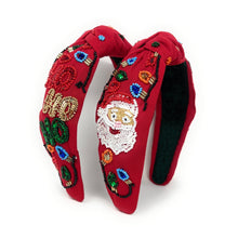 Load image into Gallery viewer, Red headband adorned with colorful beaded designs. The festive patterns create a cheerful, holiday-inspired look against a white background.