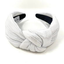 Load image into Gallery viewer, silver Headband, birthday Knotted Headband, shimmer Knot Headband, metallic Hair Accessories, light silver knot Headband, Best Seller, new years headband, best selling items, solid color knotted headband, hairbands for women, Christmas gifts, Solid color knot Headband, Solid color hair accessories, silver white headband, solid headband, light silver knotted headband, Holiday knot headband, top knot solid hairband, New Years headband, Christmas headband, Solid color headband, silver shimmer headband