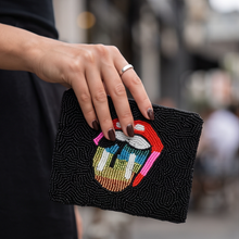Load image into Gallery viewer, Colorful rainbow tongue motif with pink, blue, green, red, white and gold beadwork on a black pouch.