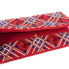 Load image into Gallery viewer, Red handbag with intricate multicolored pattern on a white background