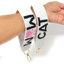 Load image into Gallery viewer, White beaded keychains with "CAT MOM" in black letters, featuring a pink paw print. Gold clasps attached. Playful and pet-themed design.