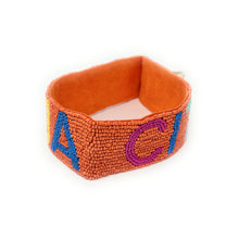 Load image into Gallery viewer, Beaded bracelet with colorful letters on a white background