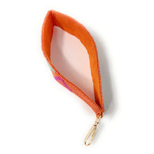 Load image into Gallery viewer, Orange fabric wristlet with a gold clasp on a white background