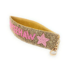 Load image into Gallery viewer, Gold beaded headband with pink lettering and star design on a white background