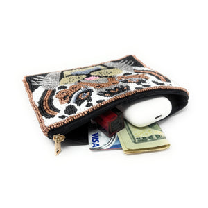 Beaded pouch depicting a tiger's face, made with intricate brown, black, white, and blue beads. The design is vibrant and expressive, with a gold zipper.