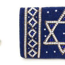 Load image into Gallery viewer, Close-up of royal blue beaded clutch featuring Star of David design and pearl detailing.