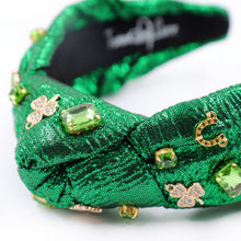 Load image into Gallery viewer, headbands for women, green knotted headband, headband style, top knot headband, green top knot headband, lucky charm jeweled headband, lucky charm hair band, green Jeweled knot headband, St Patrick’s Jeweled headband, top knotted headband, hand bead knotted headband, Clover leaf hair band for women, St Patrick’s Embellished headband, statement headbands, embellished headband, chic headband, clover leaf knot headband, st paddy’s headband, green hair accessories, four leaf clover headband, shamrock headband