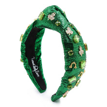 Load image into Gallery viewer, headbands for women, green knotted headband, headband style, top knot headband, green top knot headband, lucky charm jeweled headband, lucky charm hair band, green Jeweled knot headband, St Patrick’s Jeweled headband, top knotted headband, hand bead knotted headband, Clover leaf hair band, St Patrick’s Embellished headband, statement headbands, embellished headband, best selling items, clover leaf knot headband, st paddy’s headband, green hair accessories, four leaf clover headband, shamrock headband