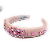 Load image into Gallery viewer, Pink headband with floral embellishments on a white background