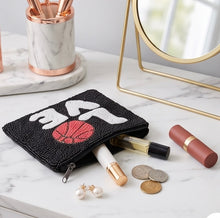 Load image into Gallery viewer, Love Basketball hand-beaded pouch showing its zipper closure and compact design for carrying everyday essentials.