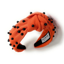 Load image into Gallery viewer, headbands for women, black orange headband, handmade headbands, orange black top knotted headband, Cincinnati Bengals knotted headband, Bengals Headband, Cincinnati football headband, black pearl headband, black orange game day headband, football headband, jeweled headband, knotted jeweled headband, Cincinnati football headband, Orange  Black knot headband, Princeton knot headband, pearly headbands, OKlahoma State headband, game day hair accessories, game day headband, football headbands, best selling items