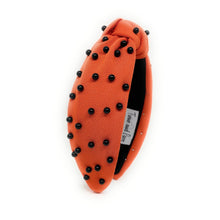 Load image into Gallery viewer, headbands for women, black orange headband, handmade headbands, orange black top knotted headband, Cincinnati Bengals knotted headband, Bengals Headband, Cincinnati football headband, black pearl headband, black orange game day headband, football headband, jeweled headband, knotted jeweled headband, Cincinnati football headband, Orange  Black knot headband, Princeton knot headband, pearly headbands, Oklahoma State headband, game day hair accessories, game day headband, football headbands, best selling items