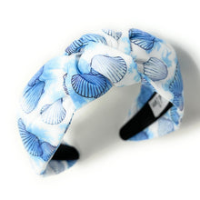 Load image into Gallery viewer, headband for women, blue knot headband, headbands for women, seashells headband, white blue headband, blue top knot headband, seashell top knot headband, blue white knot headband, summer hairband, trendy headbands, handmade headbands, blue top knotted headband, knotted headband, custom headband, fashion headbands, handmade headband, sea headband, vacation headband, blue seashells headband, handmade gifts, headband for women, best selling items, resort style, resort accessories