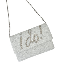 Load image into Gallery viewer, Elegant white clutch with sparkling beads, featuring the words &quot;I Do!&quot; in bold, silver lettering. It has a silver chain, conveying a bridal theme.