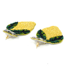 Load image into Gallery viewer, Vibrant lemon slice drop earrings with detailed bead embroidery, green accents, and glamorous gemstone studs.