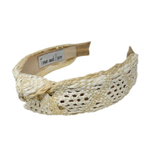 Load image into Gallery viewer, A raffia woven headband with a monochrome ivory and beige pattern, featuring a knotted design.