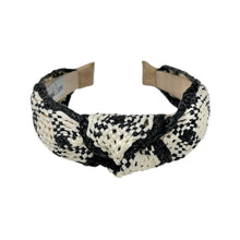 Load image into Gallery viewer, A black ivory raffia woven headband with a monochrome ivory and beige pattern, featuring a knotted design.