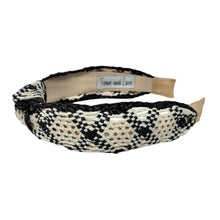 Load image into Gallery viewer, A black ivory raffia woven headband with a monochrome ivory and beige pattern, featuring a knotted designed.