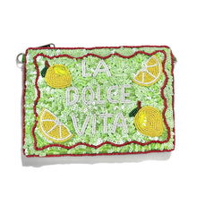 Load image into Gallery viewer, Green sequin pouch featuring “La Dolce Vita” lettering, bright lemon beadwork, and sparkling citrus-inspired details on a white background.