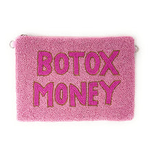 Load image into Gallery viewer, A pink beaded pouch with the words 'BOTOX MONEY' embroidered in pink letters outlined in gold, shown on a plain white background.