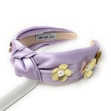 Load image into Gallery viewer, Elegant lavender headband adorned with gold flowers and pearls.