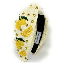 Load image into Gallery viewer, Summer-themed white headband adorned with bright lemon motifs, green leaves, and delicate bead detailing.