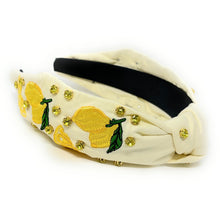 Load image into Gallery viewer, Outdoor fashion look with a playful lemon print headband, tropical-inspired earrings, and casual summer styling.