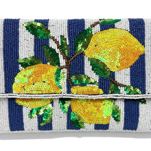 Load image into Gallery viewer, A beaded clutch bag featuring a navy blue and white striped background with sequined yellow lemons and green leaves, secured by a matching beaded strap.