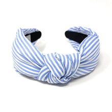 Load image into Gallery viewer, Light Blue and white striped headband with a knotted detail in the center, set against a plain white background, conveying a trendy, nautical style.
